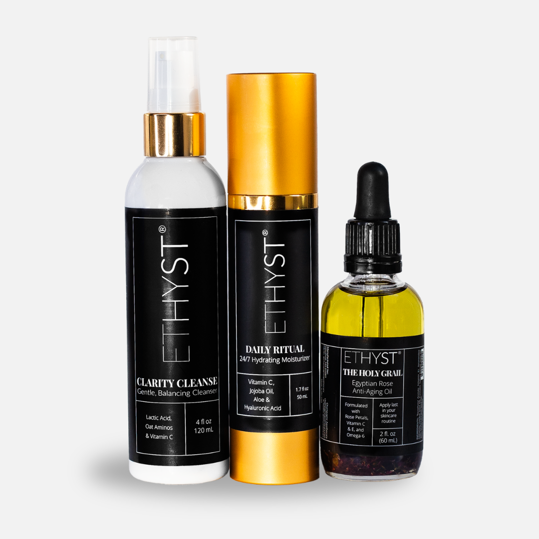 ETHYST Microbiome Skincare Trinity System featuring Clarity Cleanse, Daily Ritual moisturizer, and The Holy Grail facial oil.