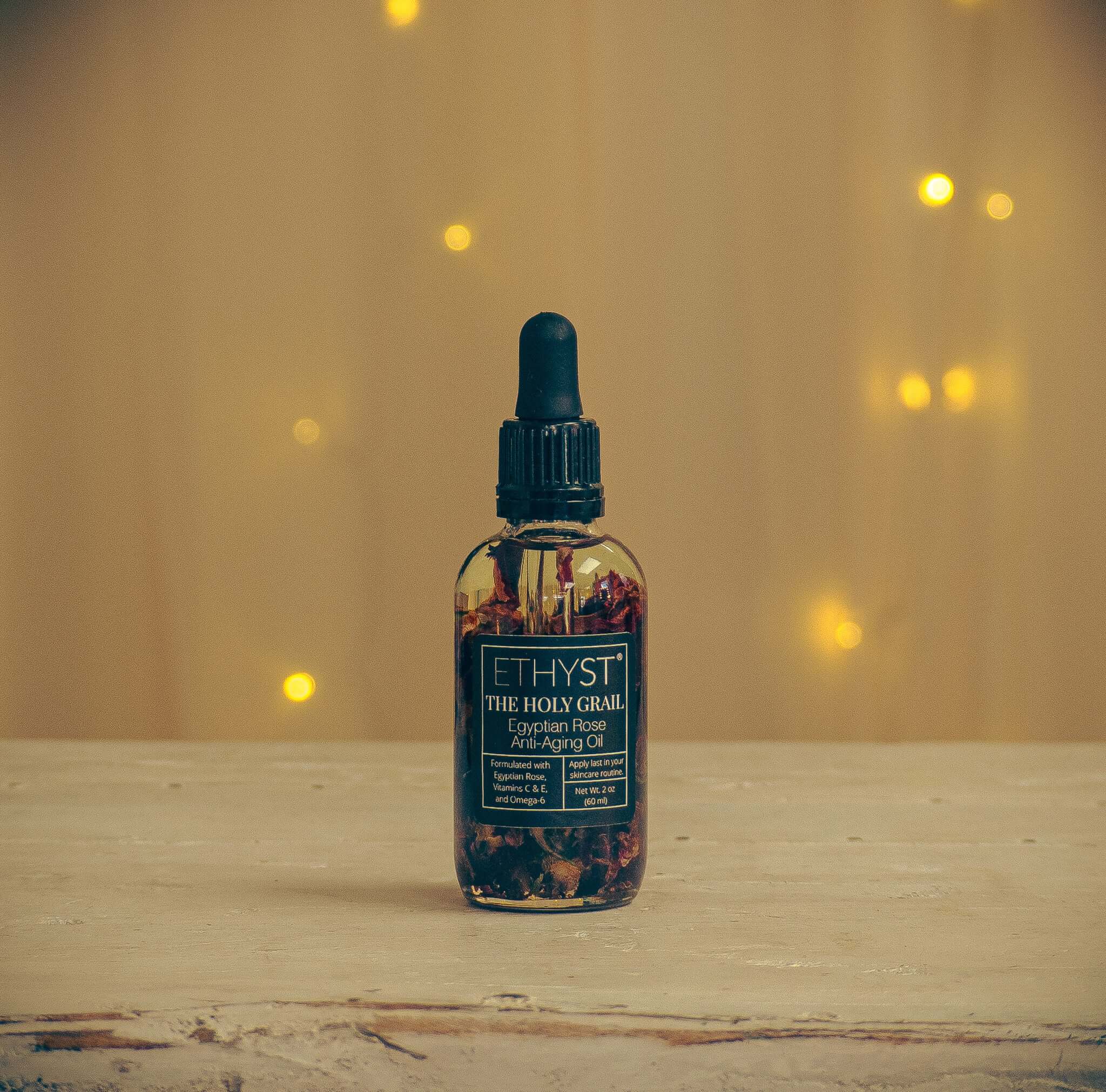 ETHYST® The Holy Grail™ Egyptian Rose Infused Anti-Aging Facial Oil contains Vitamin E that helps aid in acne scarring, hyperpigmentation, and prevents aging and wrinkles. Found at Champagne Apothecary in Westfield, Massachusetts on School Street. It is an enchanting small town shop specializing in professional skincare and self-care gifts.